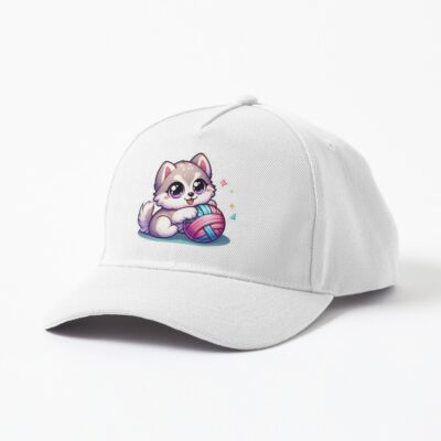Husky baseball cap playing yarn ball